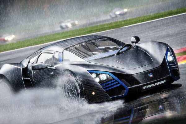 Supercar marussia b2 on the track in the rain