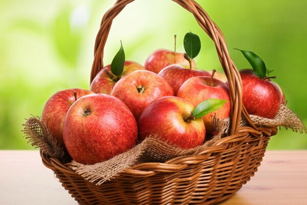 Red apples in a wicker basket