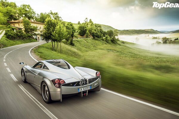 Supercar on a fast winding road