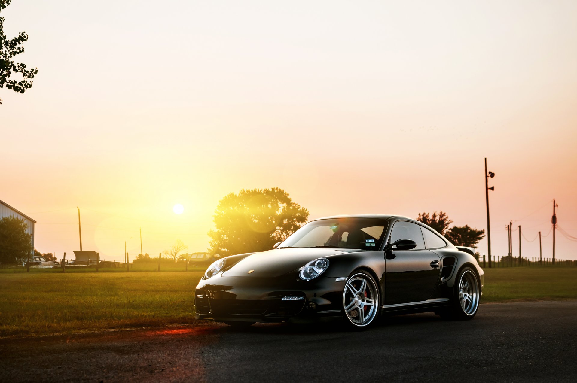 porsche 911 turbo schwarz vorne porsche sonne blendung