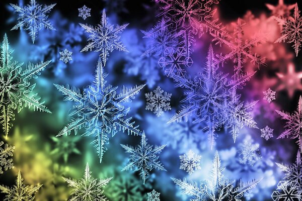 Winterschneeflocken auf gefrorenem Fenster