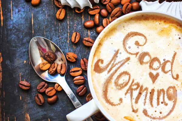 Inscription made of coffee foam in a mug