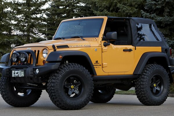 Yellow SUV with huge wheels