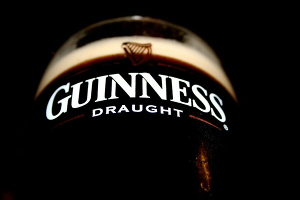 Dark beer in a glass close-up