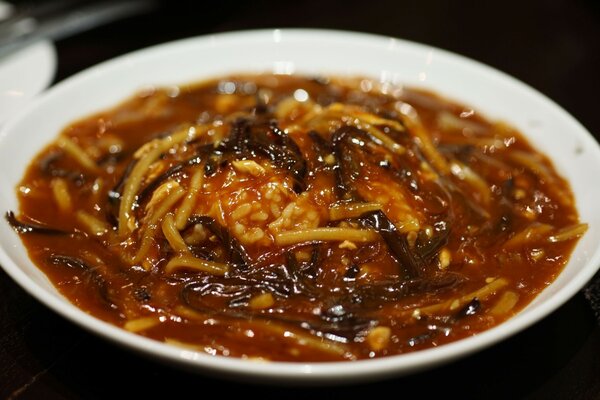 Noodles with rice in tomato sauce