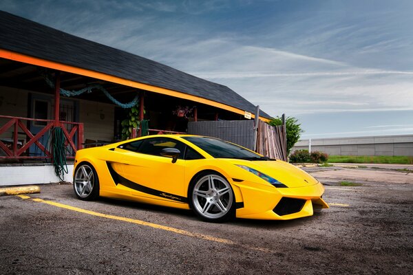 Yellow Lamborghini in the parking space