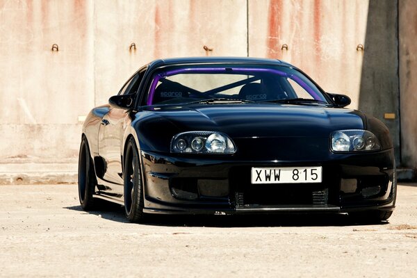 Front view of a black sports Toyota