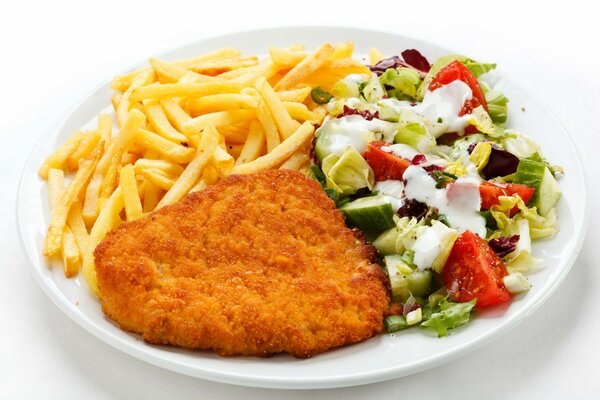 Lunch on a plate - cutlet, French fries and salad