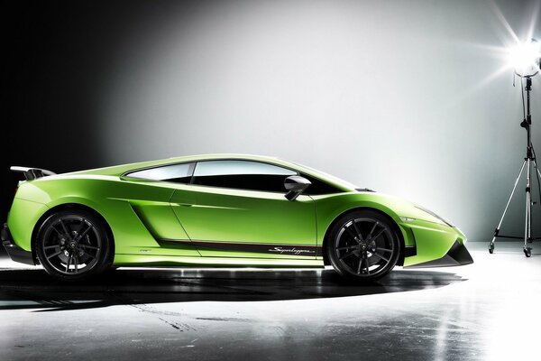 Green lamborghini gallardo on a gray background