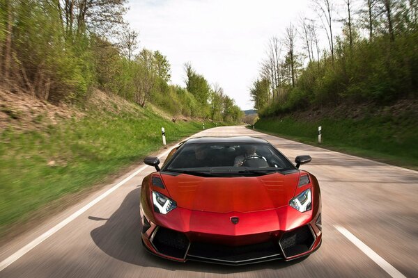 The red Lamborghini Aventador is on the move