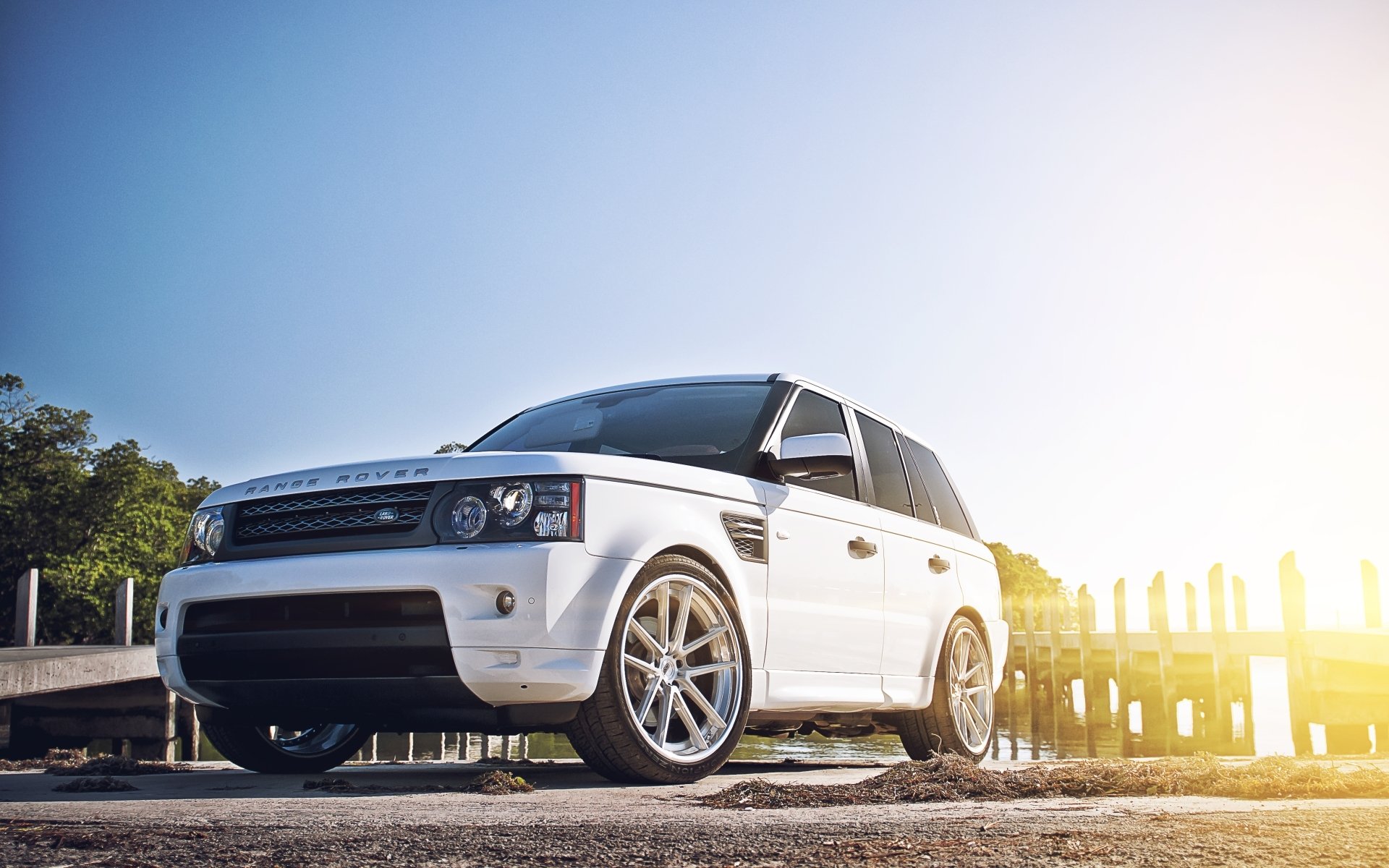 land rover range rover sport white ranged rover sports beach pier sky sun