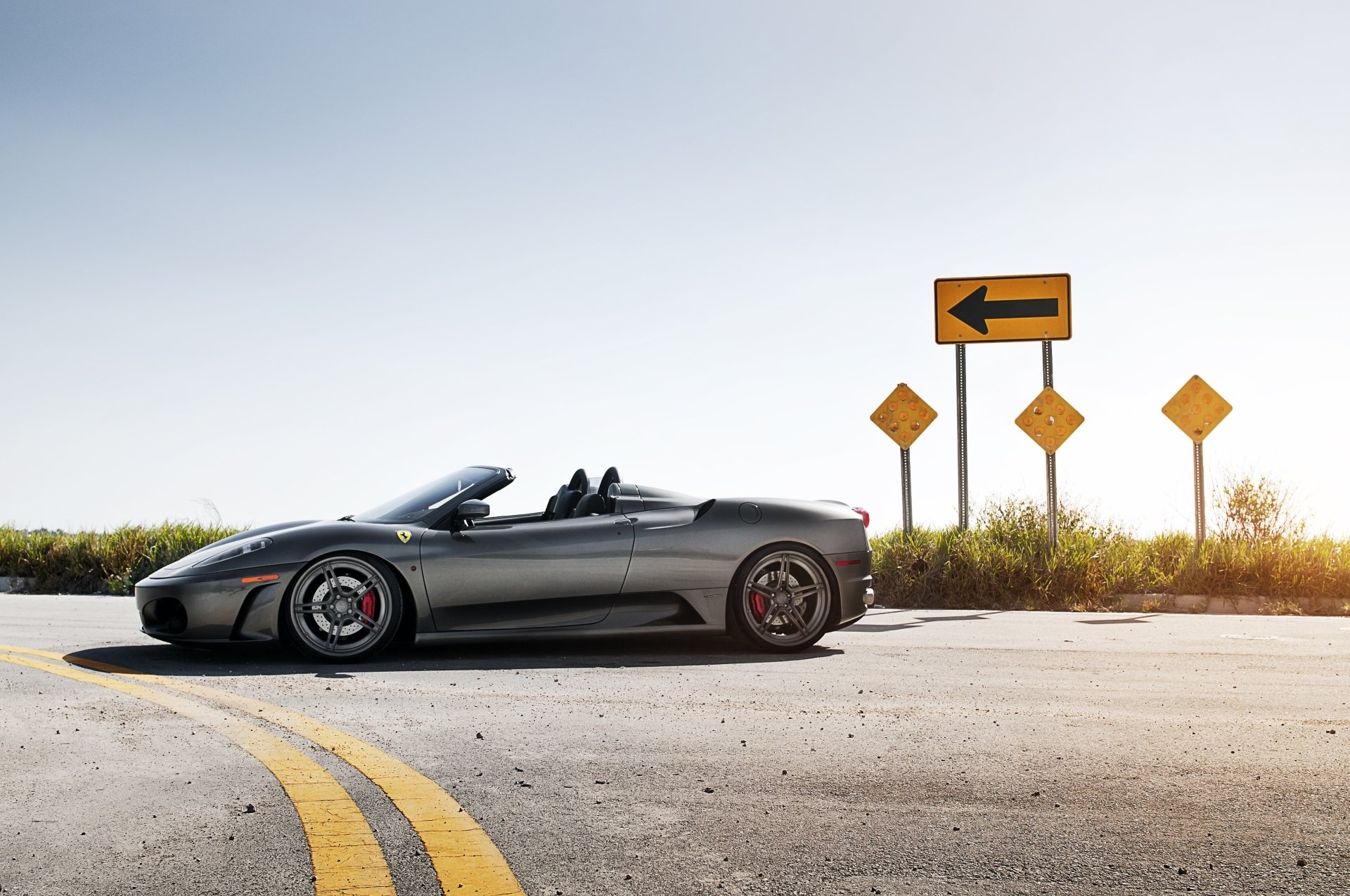 ferrari f-430 spider ferrari f-430 spider supercar gray side view road sign arrow sky