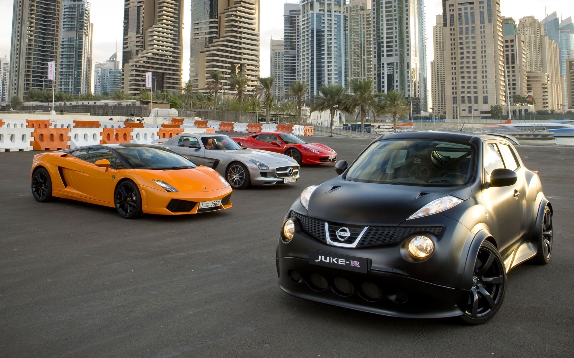 nissan juke r and lamborghini gallardo ferrari italia mercedes-benz sls amg nissan juke lamborghini gallardo ferrari italy mercedes sls amg dubai supercar