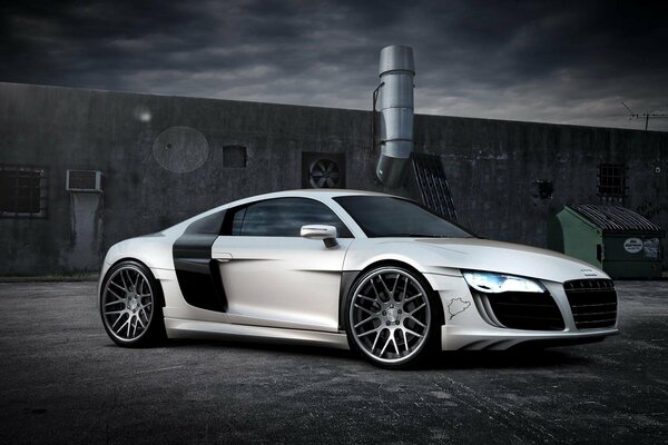 Audi r8. White car on a gloomy gray background