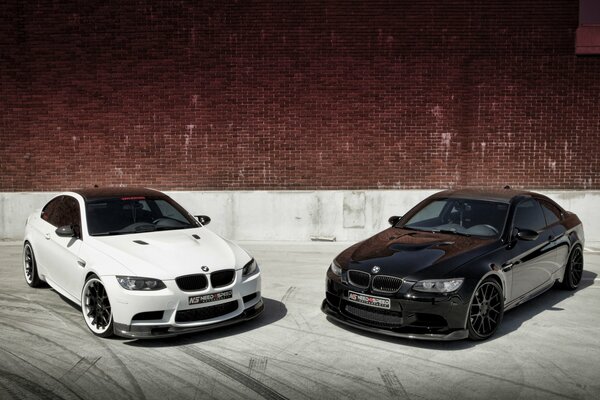 Two BMWs in white and black