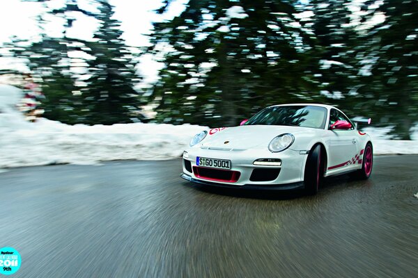 The Porshe 911 GT3 RS takes a turn at speed