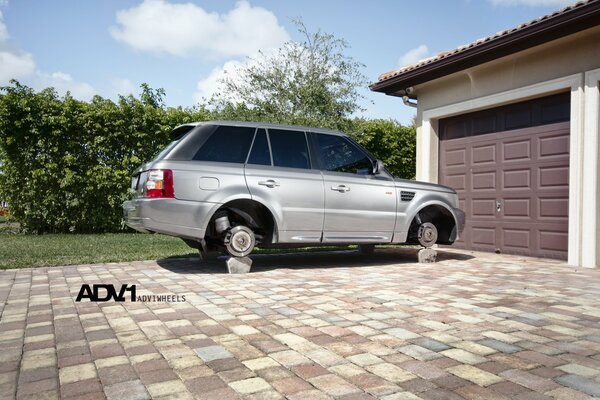 A wheelless car on a stand