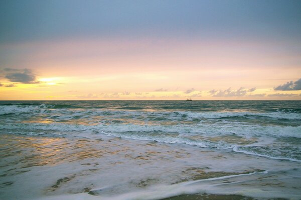 Raging waves at sunset