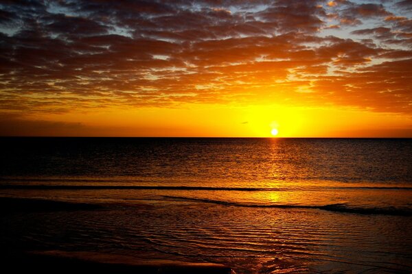 Orange sunset on the boundless ocean