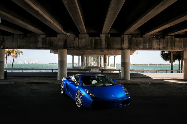 Blue under the bridge sports lamborghini