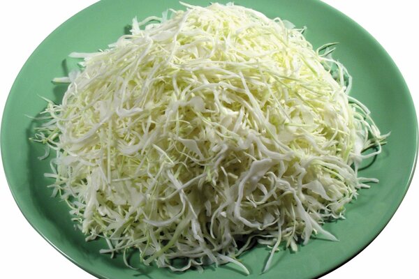 Green plate of shredded cabbage