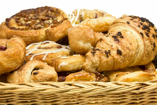 There is a whole mountain of delicious pastries in the basket