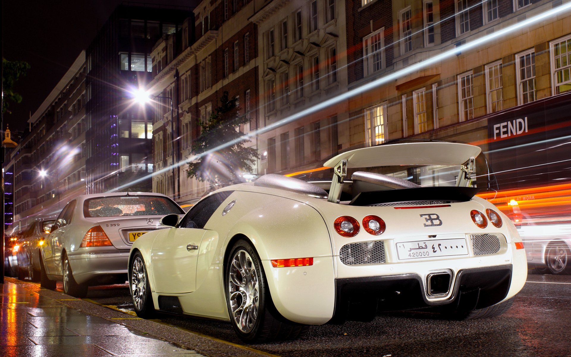 bugatti veyron ciudad noche luces exposición