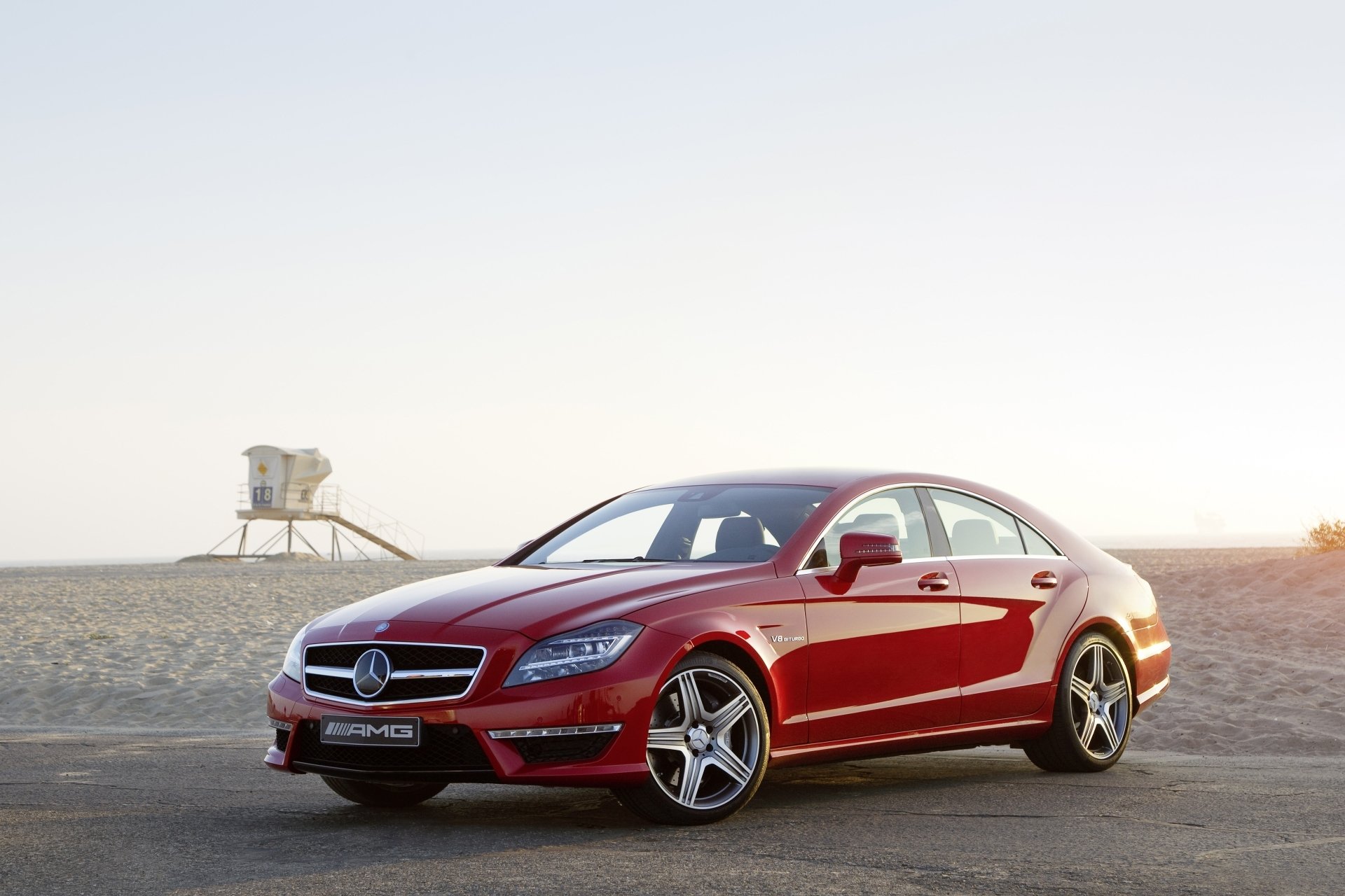 mercedes-benz cls63 amg mercedes cls63 amg sedan red front beach sky