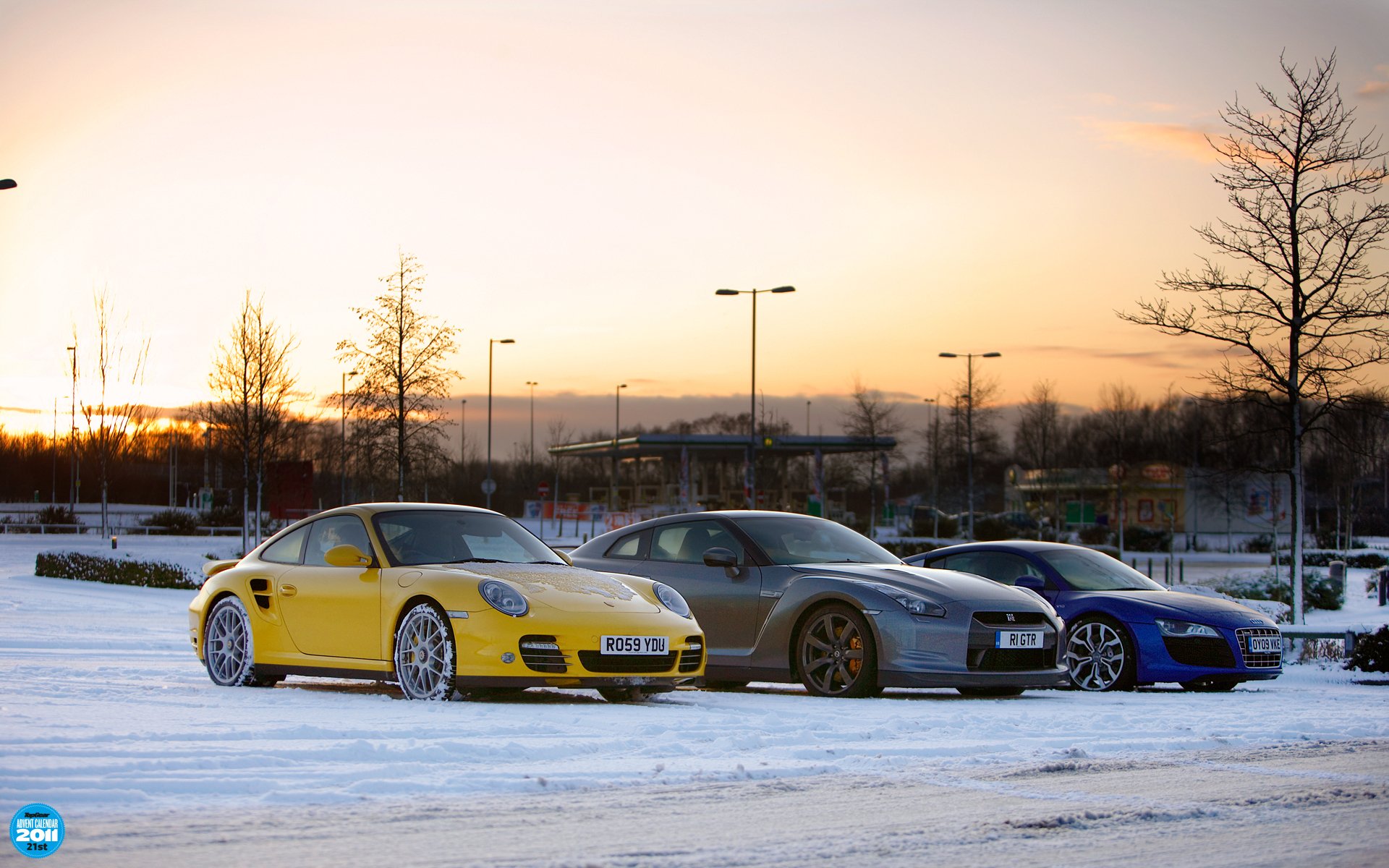 top gear adventskalender 21. top gear top gear porsche 911 nissan gt-r audi r8 supersportwagen front winter schnee sonnenuntergang himmel