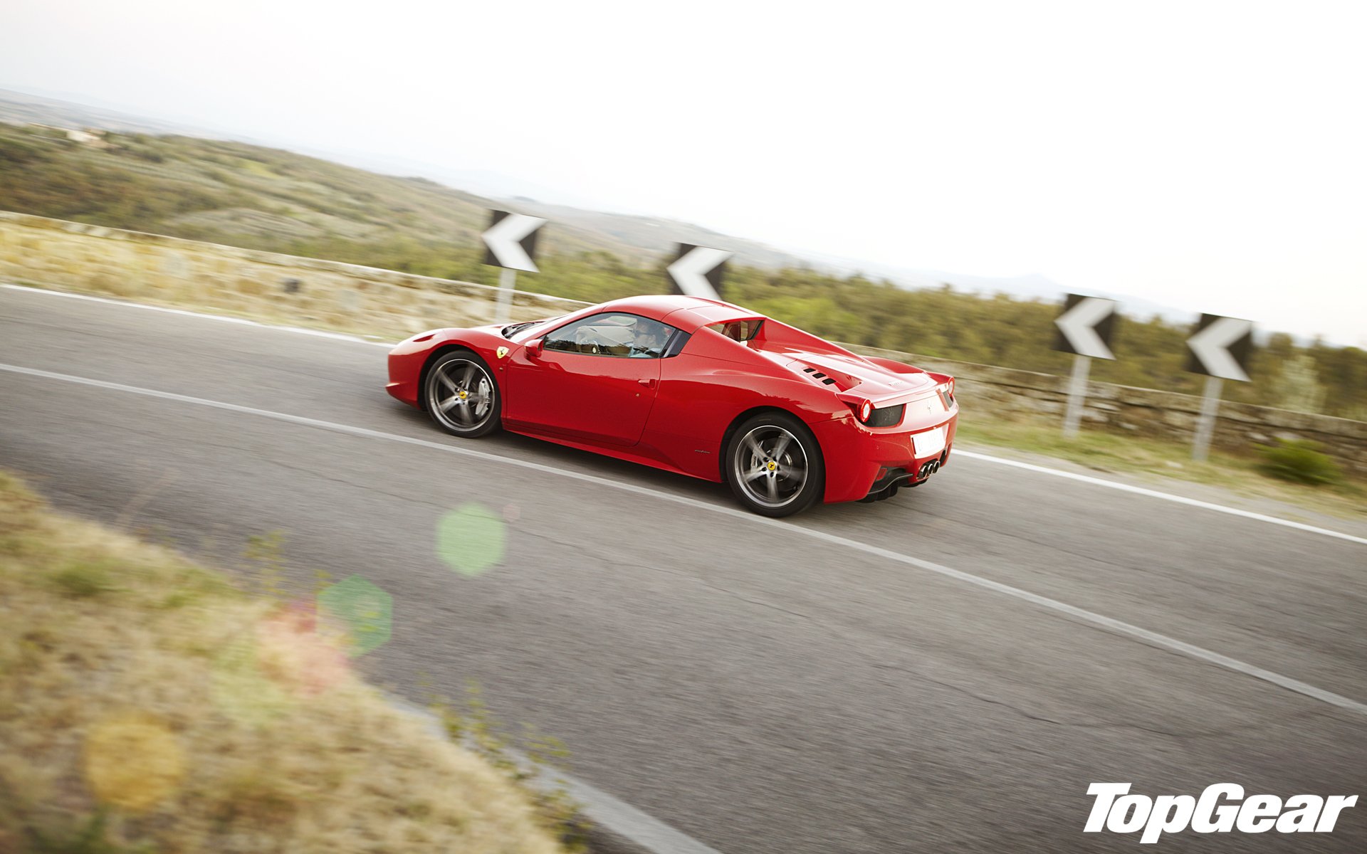 top gear top gear marcia più alta la migliore trasmissione televisiva ferrari italia spider ferrari italia spider supercar vista laterale rosso strada svolta