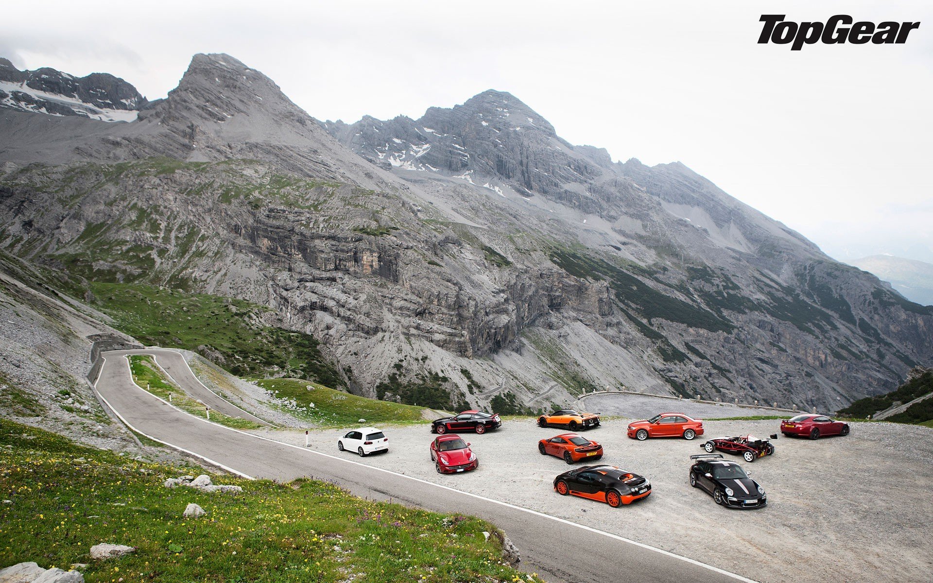 top gear supercars montagne route porsche 911 gt3 rs bugatti veyron super sport ariel atom jaguar xk-rs bmw m1 mclaren mp4-12c pagani zonda r ferrari etc. ford mustang boss 302 laguna seca volkswagen golf r