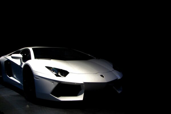 White lamborghini car on black background