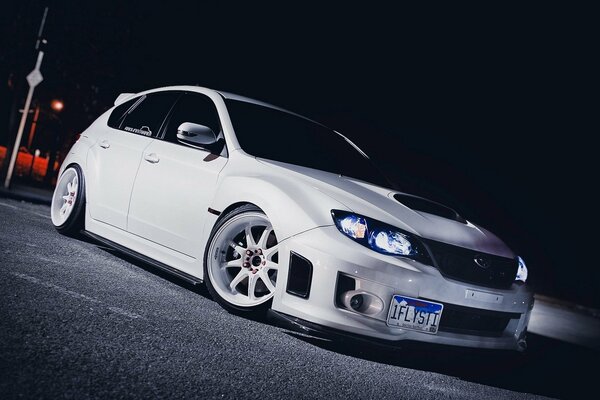 White Subaru impreza car at night