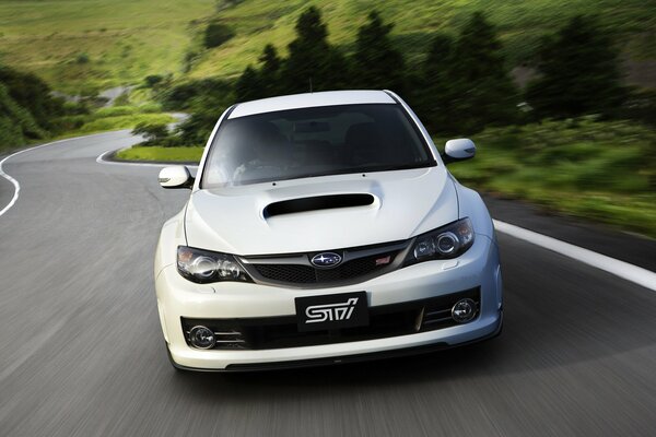 White Subaru Impreza Sports Car