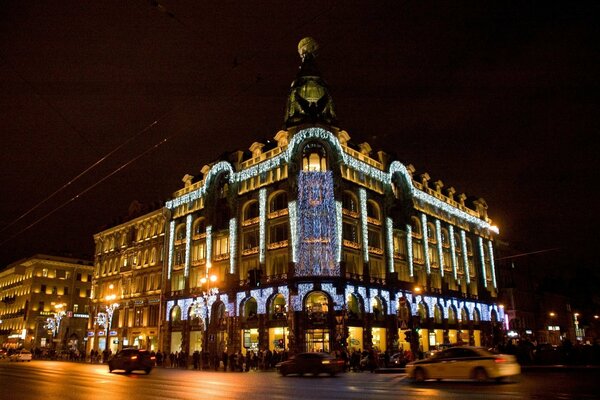 Singer s House in St. Petersburg at night