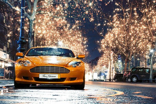 Glänzende aston martin helle lichter stadt