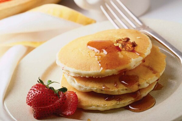 Foto Desayuno panqueques con fresas