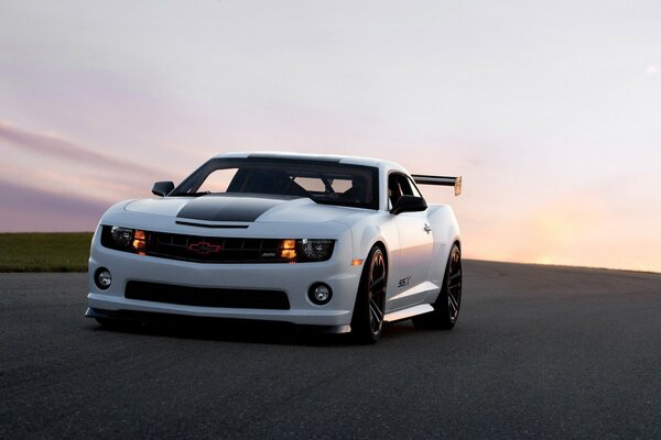 White sports car on the road