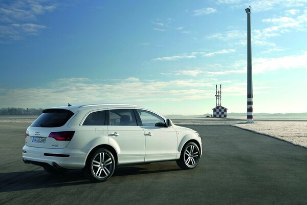 White Audi Q7 SUV parked in an open space