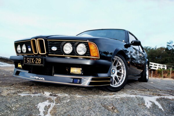 Black BMW front view of the headlights