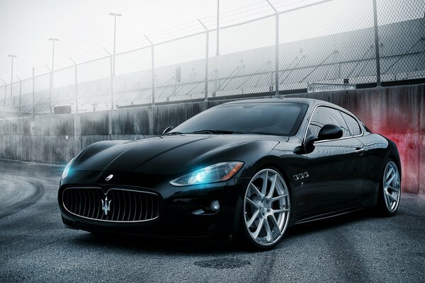 Black maserati. Alloy wheels. Bright headlights