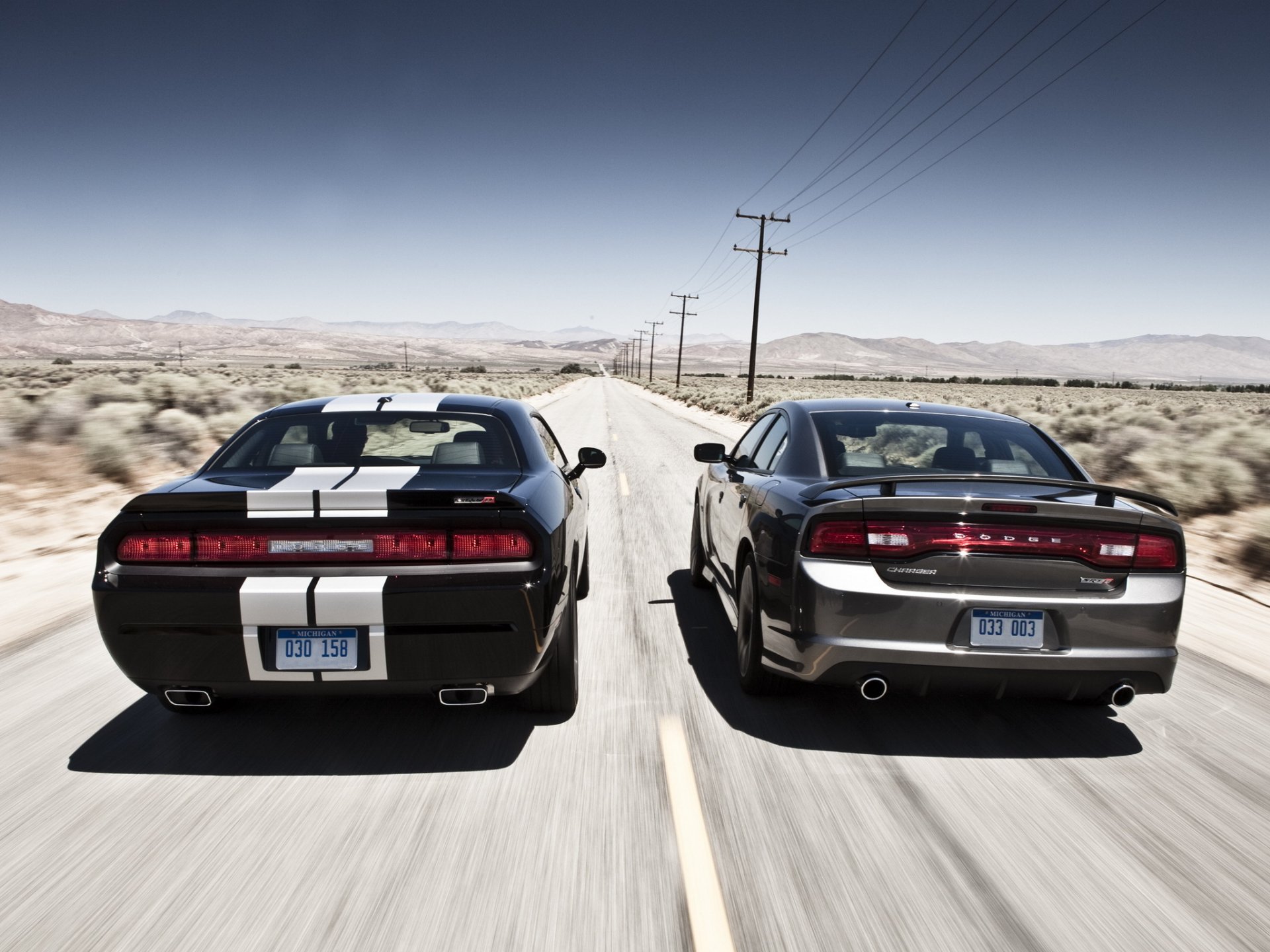 dodge challenger srt8 charger dodge challenger charger srt8 coupe sedan road.horizon.mountains sky rear view muscle car