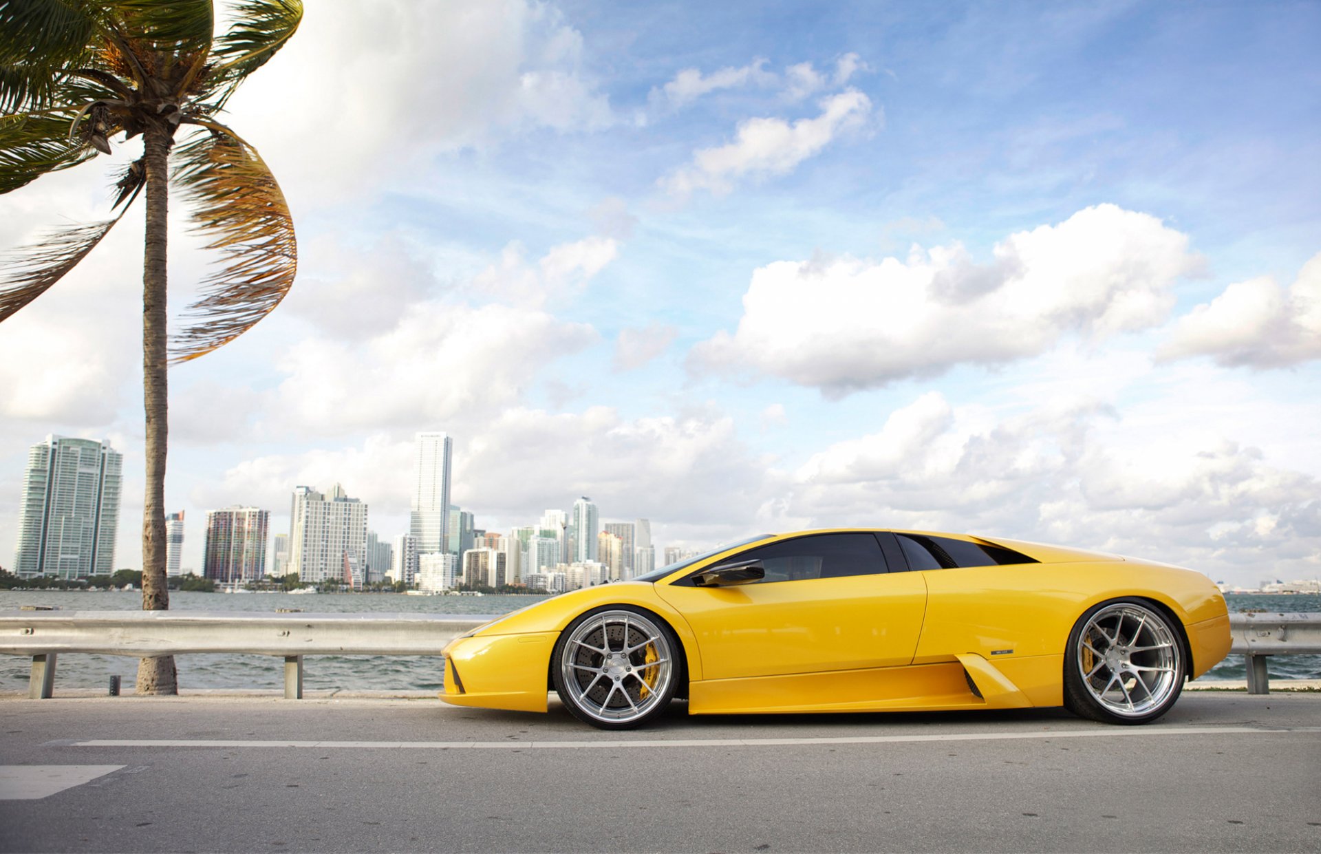 lamborghini yolk drives road palma sky clouds wind miami