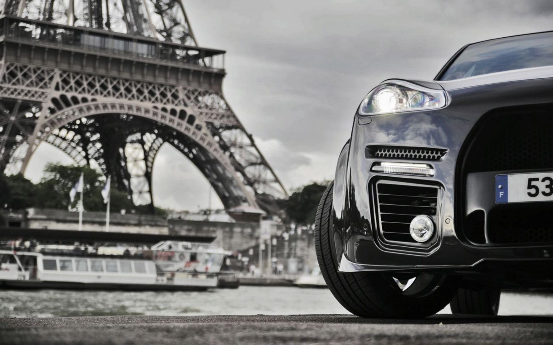 porsche cayenne eiffel tower town river boat