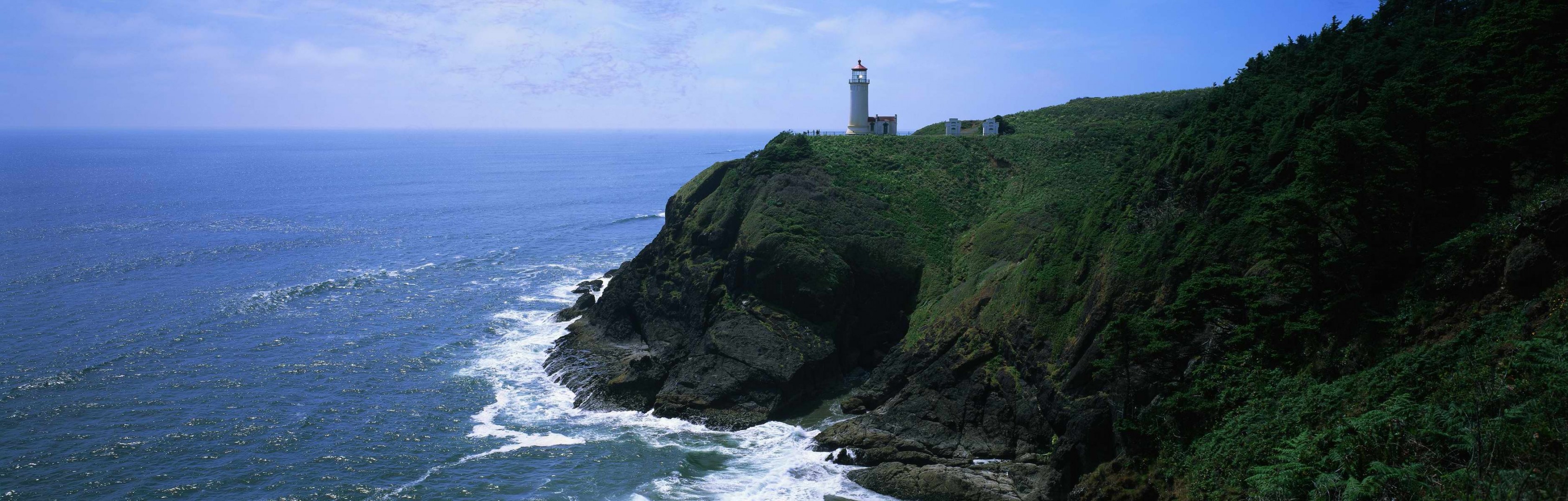 lighthouse waves rock