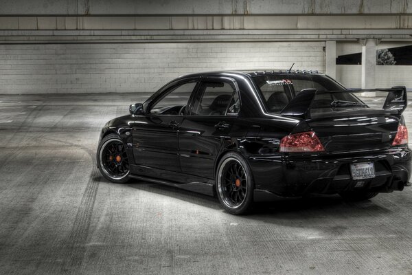 Beautiful black mitsubishi car with spoiler