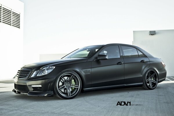 Black Mercedes Benz e63 car on the road