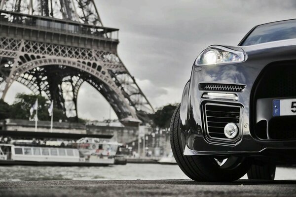 Porsche Cayenne on the banks of the Senna at the Eiffel Tower