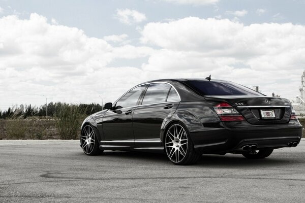 Black Mercedes amg on asphalt