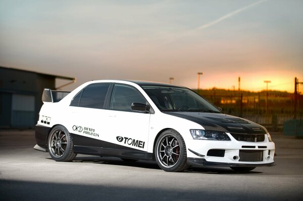 Understated tuned mitsubishi at sunset